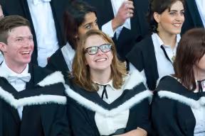 Graduands seated in the Sheldonian Theatre on Degree Day
