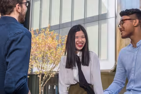 Students in front of the Zaha Hadid-designed Investcorp building in St Antony's College