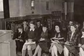 Enid Starkie, Fellow and Tutor in Modern Languages, gives a lecture in Somerville College in 1944