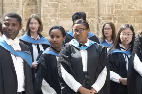 Master's graduands outside the Sheldonian Theatre on Degree Day