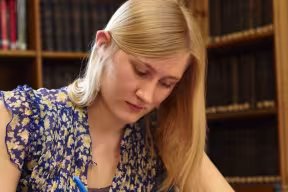Student studying in the main reading room of the Taylor Institution Library