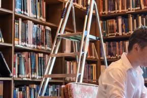 Studying in the upper floor of the New College Library