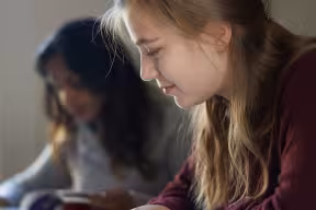 Two Oxford students sat studying.