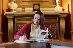 Student studying in the main reading room of the Taylor Institution Library