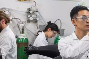 Researchers in a Materials lab with equipment