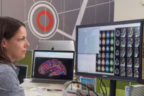 Researcher looking at brain imaging data