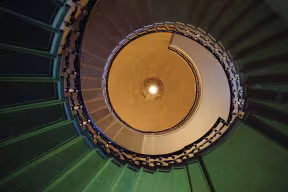 Spiral staircase leading up through the college