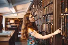 A Graduate Access Programme participant visits the library.