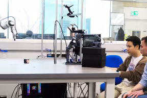 two researchers at a computer