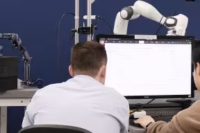 researchers at a computer