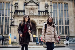 STUDENTS IN FRONT OF THE EXAMINATION SCHOOLS