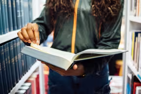 Student holding a library book