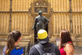 Visitors at the Duke of Pembroke statue, Bodleian Library