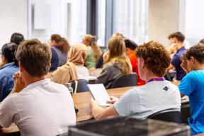 Students in a classroom for UNIQ