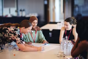 participants at OPEN Networking Day working together 