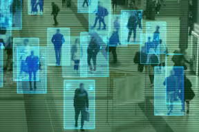 Overhead view of people walking through a public space, with blue digital boxes and overlays projecting tracking or facial recognition markers around individuals.