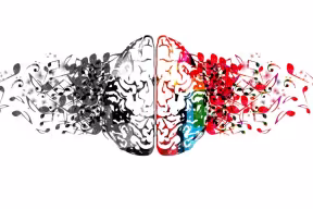 Stylized illustration of a split human brain, with black-and-white musical notes on one side and colorful musical notes on the other, radiating outward.