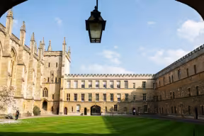 New College quad pictured through an archway