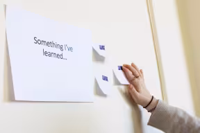 Feedback board with notes being added