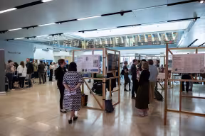 People explore exhibits at the Vice-Chancellor's Awards showcase 2025
