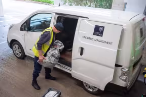 Loading a van for mail distribution at University Offices