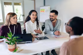 Person in interview in front of a panel