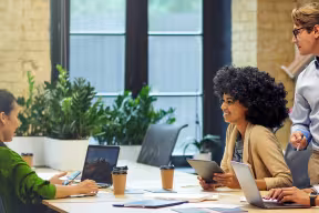 Group of people working together in an office