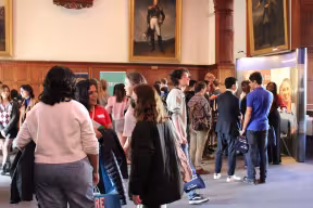 Students speak with employers at a University of Oxford careers fair.