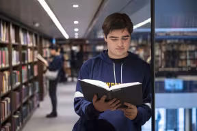 STUDENTS READING IN THE WESTON LIBRARY