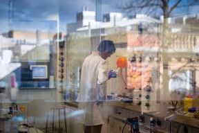 STUDENT WORKING IN THE ANDREW HAMILTON LABORATORY, CHEMISTRY
