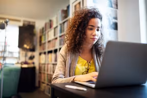 Person typing on laptop 