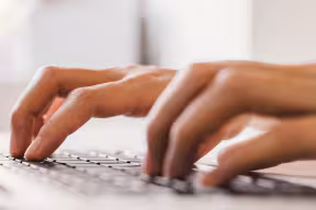 hands on a keyboard