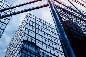 buildings reflected in windows