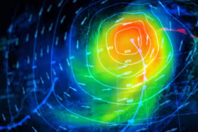 Digital heat map showing a developing storm with characteristic spiral shape