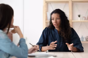 People talking in office meeting