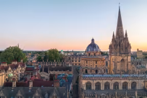 An view of the skyline of Oxford at dusk