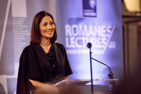 Image of Mishal Husain on stage at the Sheldonian Theatre delivering the Romanes Lecture 2025