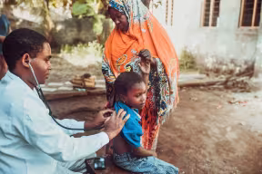Doctor and child. Credit: zelijkosantrac, Getty Images