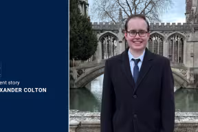Alexander Colton standing in front of the Bridge of Sighs at St John's College, Cambridge.