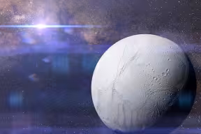 Artistic illustration of Saturn’s icy moon, Enceladus in front of a galaxy backdrop and the bright Sun