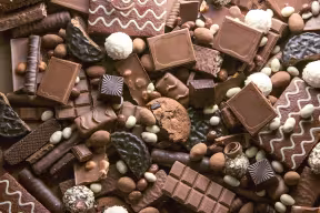 Assorted chocolate biscuits, pralines and bars.