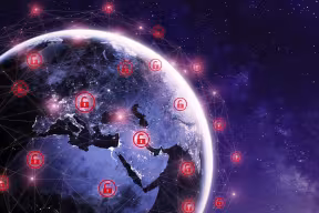 Global cyber attack around the world with planet Earth viewed from space and internet network communication under cyberattack portrayed with red icons of an unlocked padlock. 