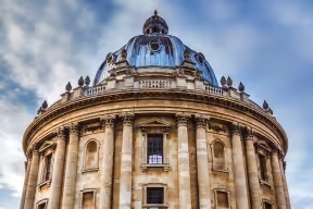 The Radcliffe Camera against a blue and cloudy sky