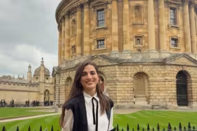 Oxford student Doruntina Aruqaj in front of the Radcliffe Camera