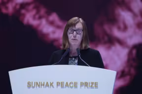 Professor Gilbert delivers a speech at the Sunhak Peace Prize ceremony