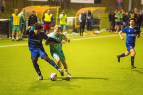 Jaydon plays football at a varsity match