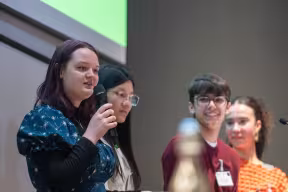 Lauren speaking with the Colloquium's Brasenose student team