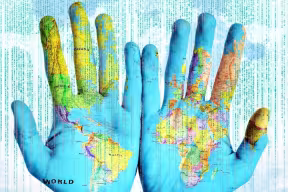 The world map on a pair of hands