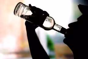 Man drinking vodka