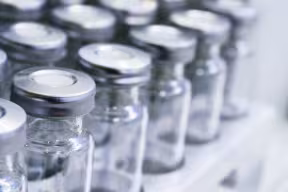 Photo | Vaccine vials on a shelf